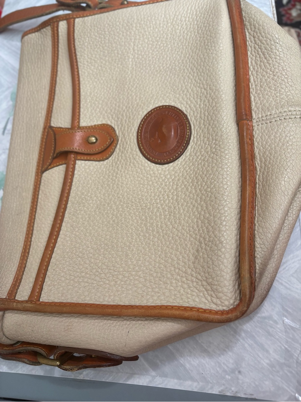 Dooney & Bourke Cream Pebbled Leather Shoulder Bag with Tan Trim